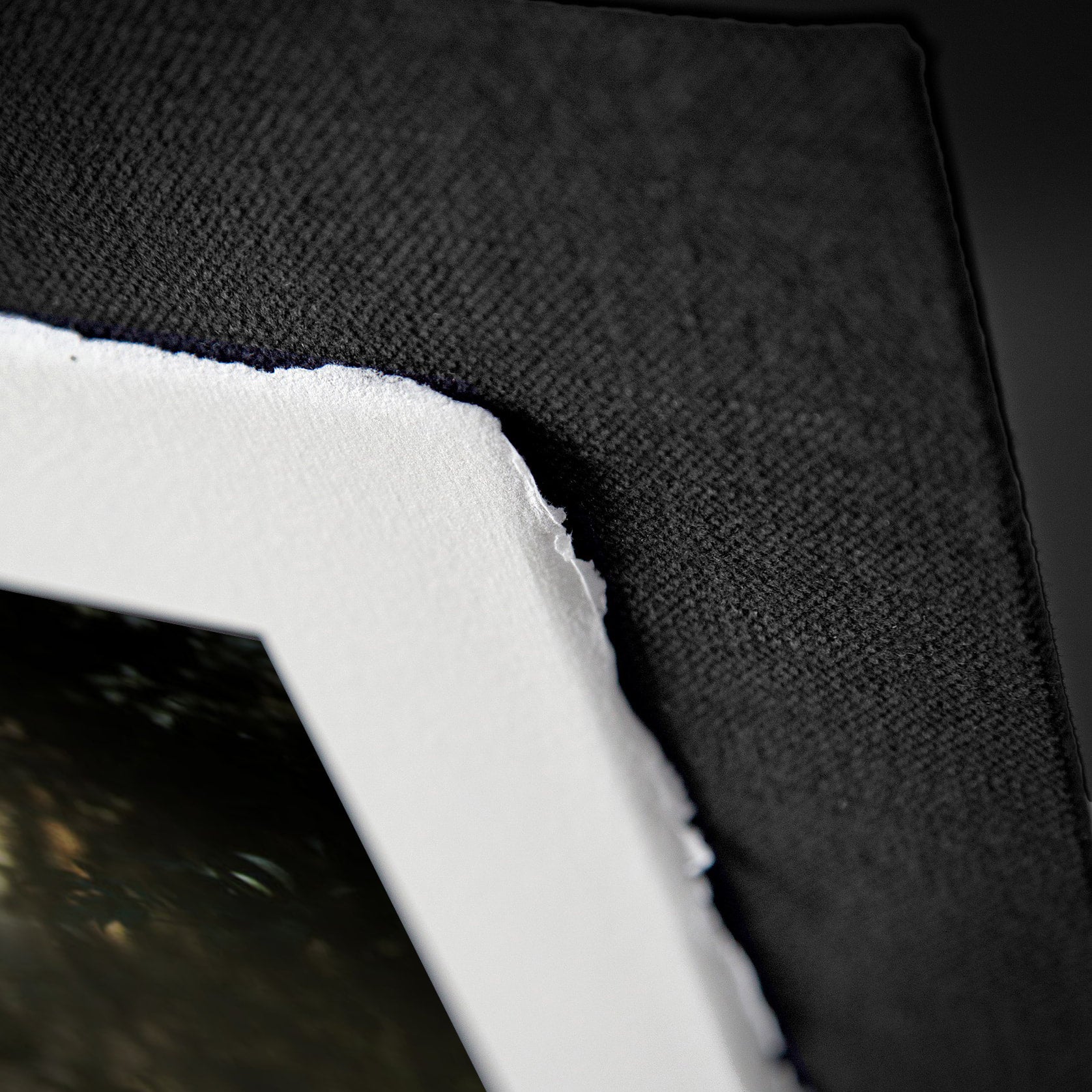Handmade Amalfi cotton paper production — artisan filtering cotton pulp on a wooden screen